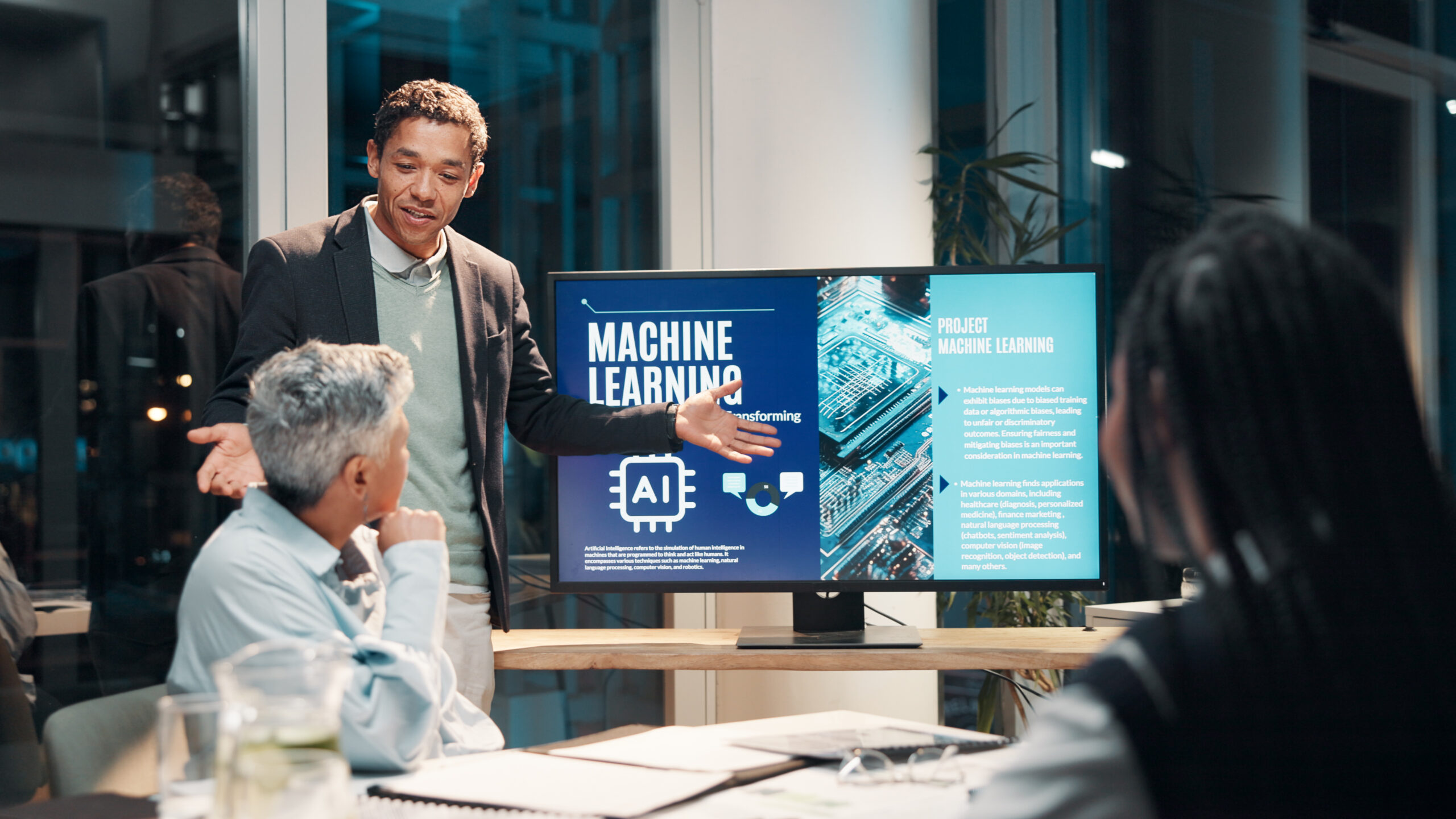 Businessman, screen and presentation in meeting for ai, machine learning or training in workshop office